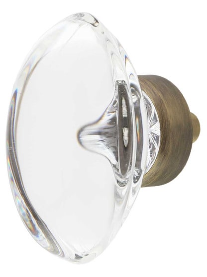 Oval Clear Crystal Cabinet Knob - 1 3/4 inch x 1 1/16 inch in Antique Brass.